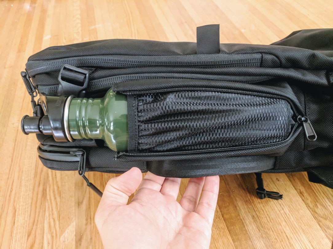 Aer Travel Pack 2 Water bottle holder zips up in use with Klean Kanteen