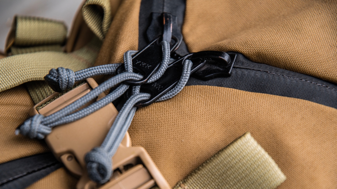Mystery Ranch 3DAP Tri-zip backpack review zipper pull details fabric closeup buckles