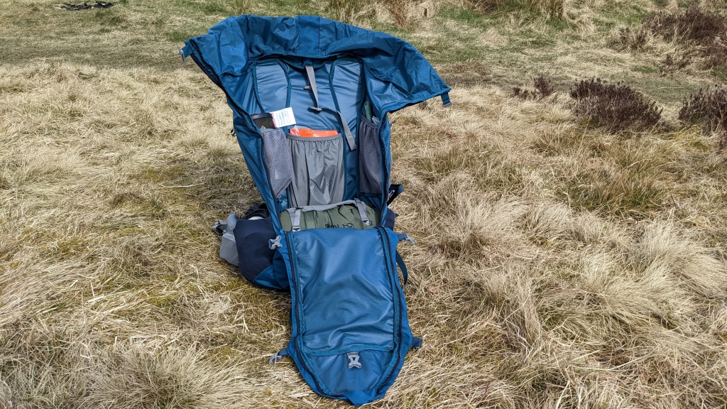 Mystery Ranch Bridger 55 backpack front panel open internal pockets mesh pouches jetboil stove water bladder sleeve sleeping bag compression straps quick access system